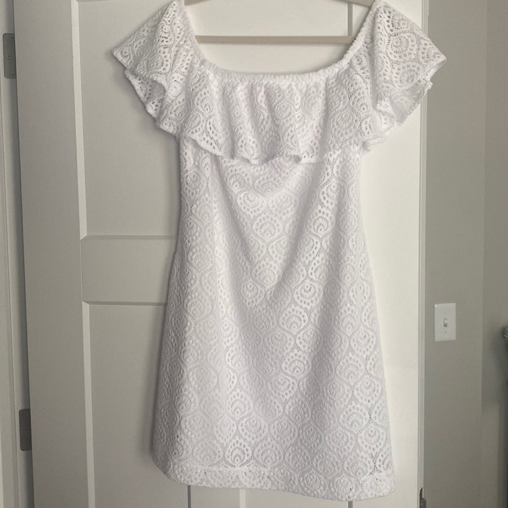 White beautifully detailed off the shoulder Lilly dress.